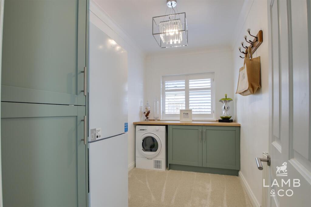 BEDROOM FIVE/UTILITY ROOM