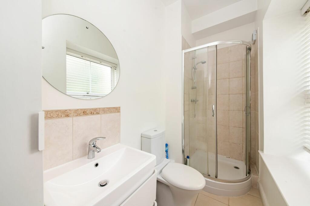 BEDROOM ONE EN-SUITE SHOWER ROOM