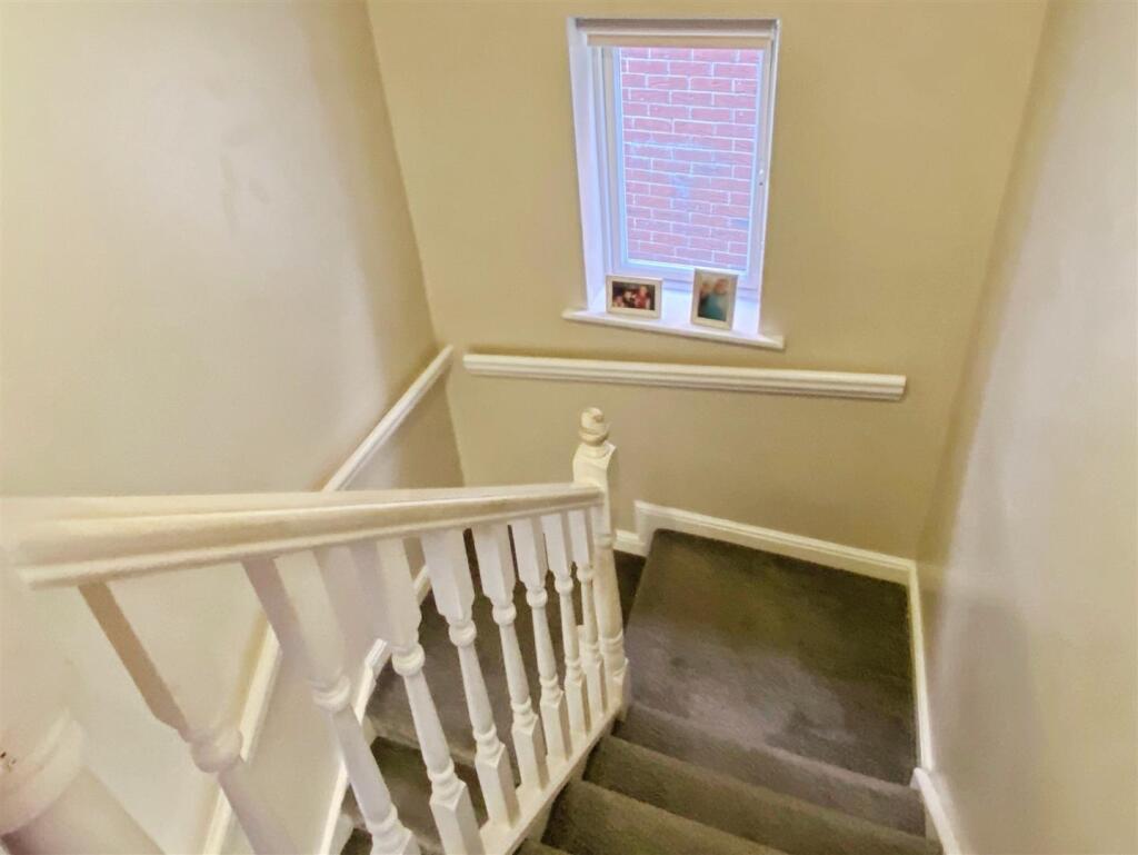 Stairs to first floor and landing