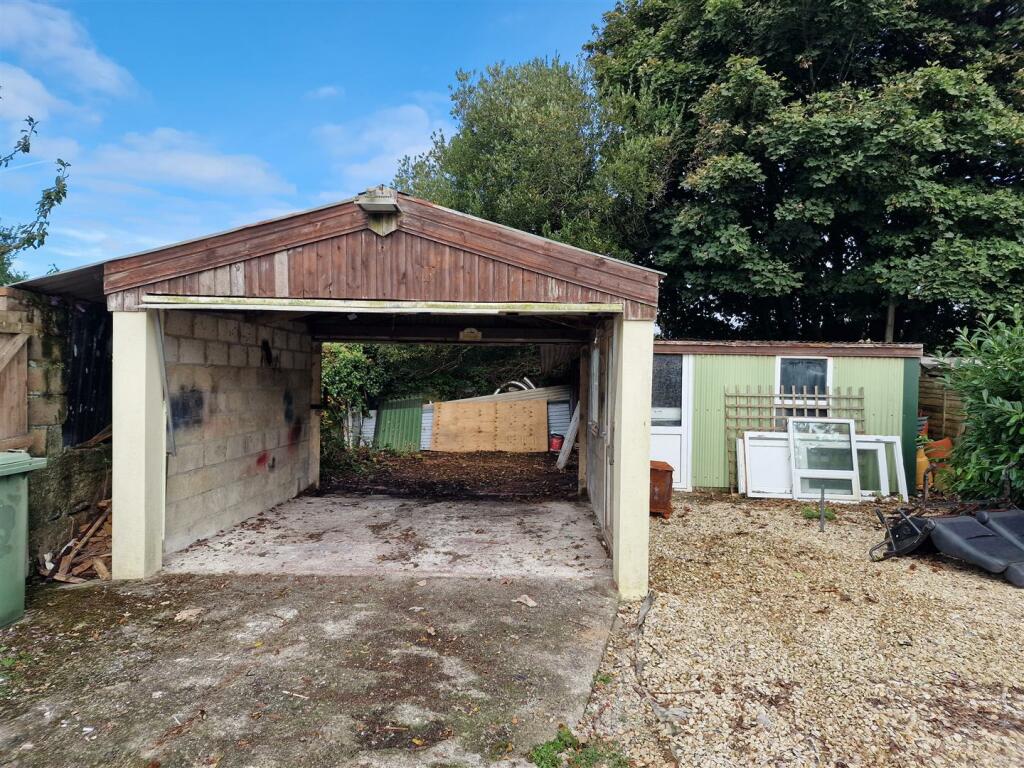 Rear Garages and Workshop.