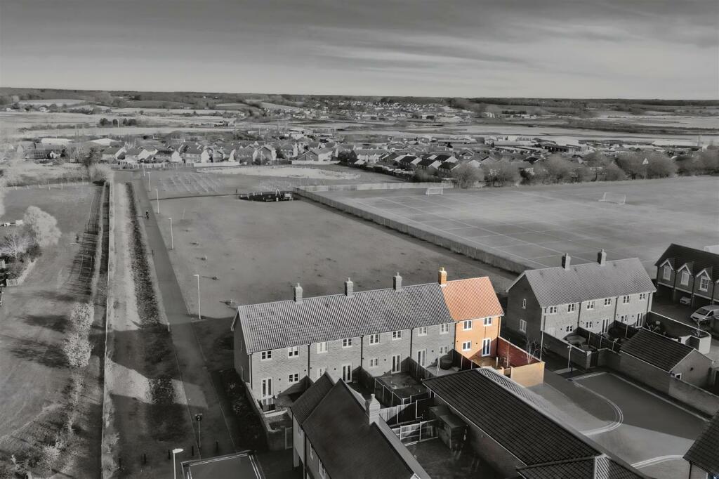 DRONE SHOT OVERLOOKING GREEN