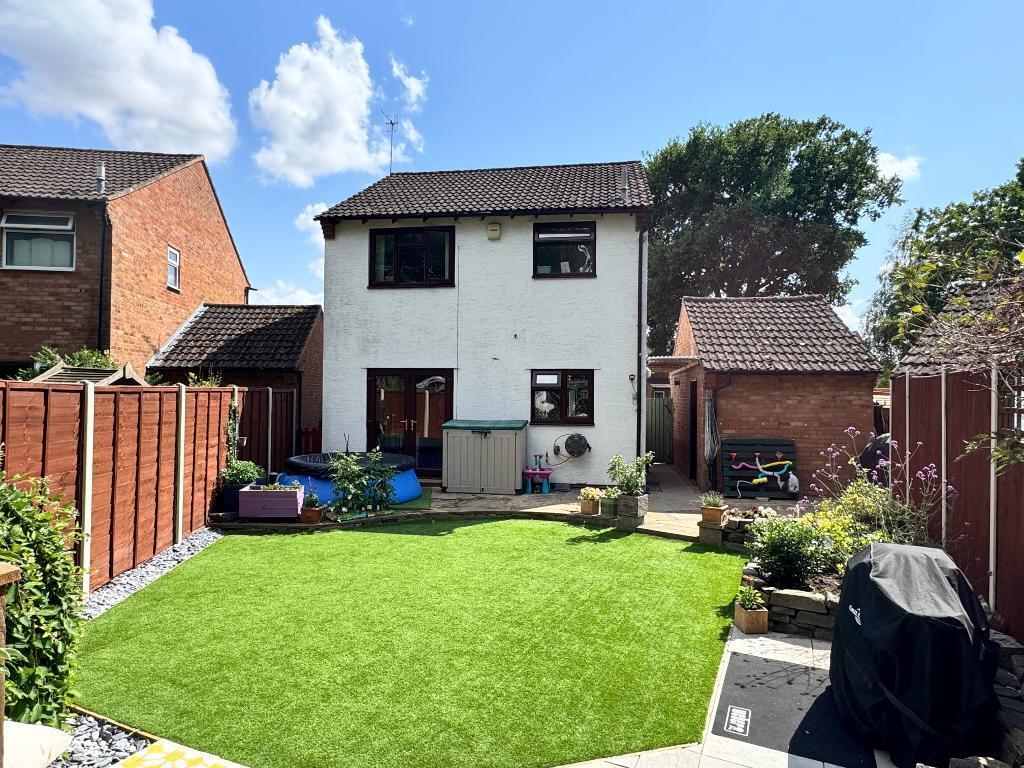 Rear of house, garden and garage