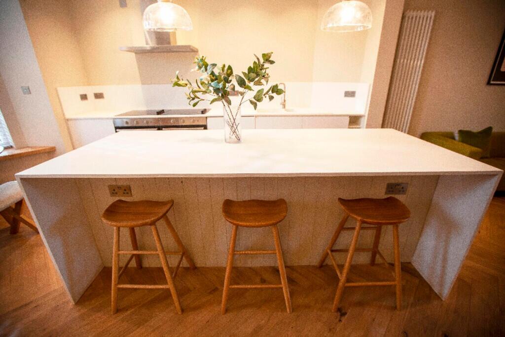 A modern and inviting kitchen area featuring a ...