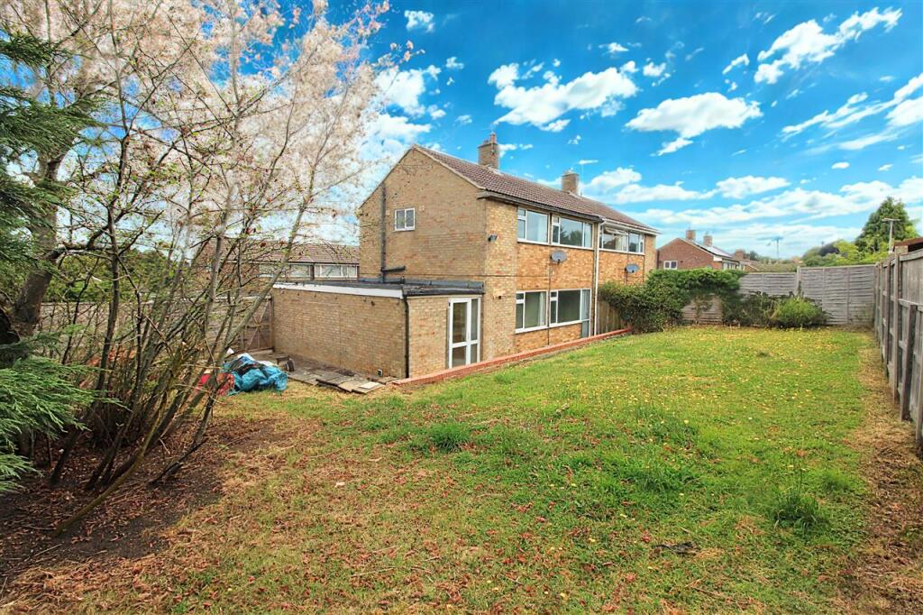 SIDE AND REAR GARDEN