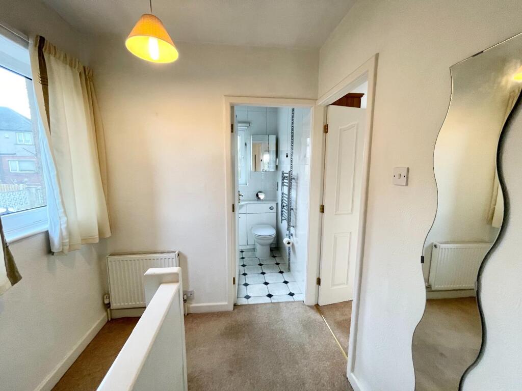 TO THE FIRST FLOOR LANDING