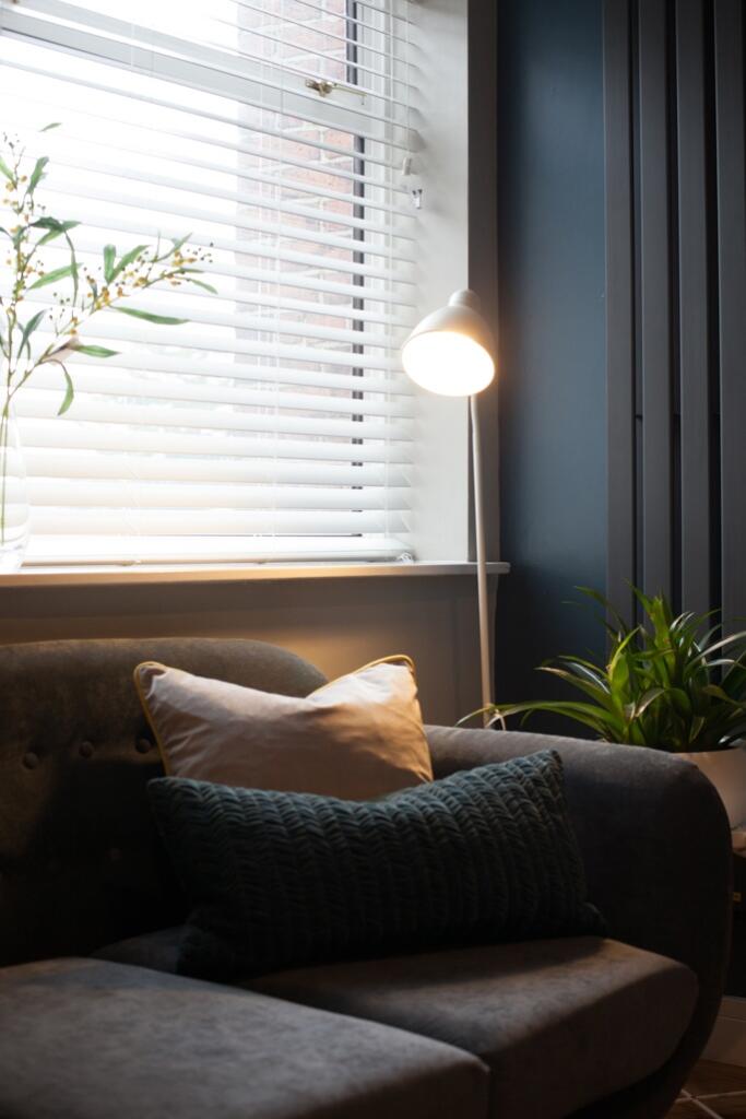 A cozy and well-maintained living area with nat...