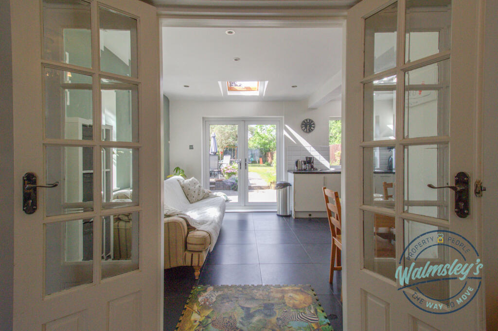 French doors to kitchen dining &amp; family room