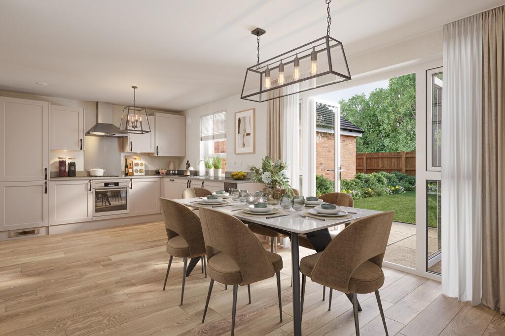 Kitchen and dining room in the 4 bedroom Kennisham July 25