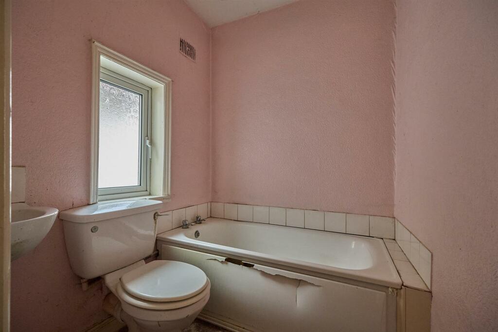 BATHROOM TO FRONT