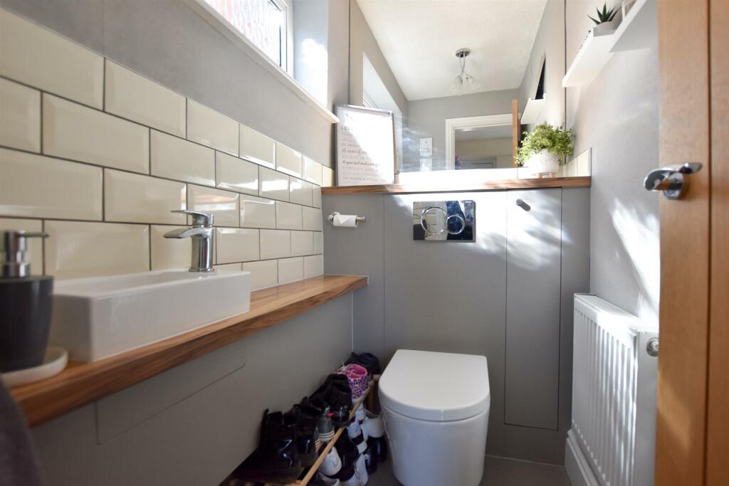 DOWNSTAIRS WC/CLOAKS