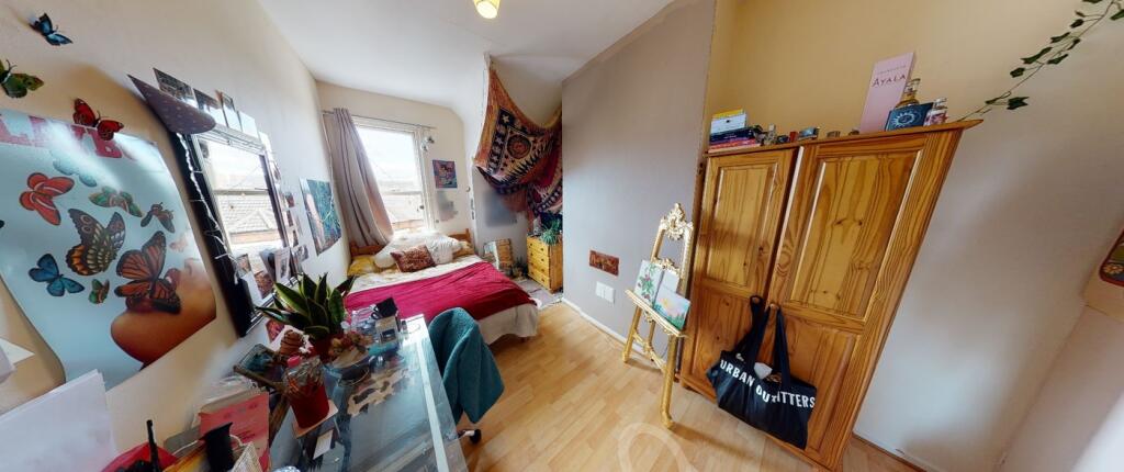 A vibrant and inviting double bedroom filled wi...