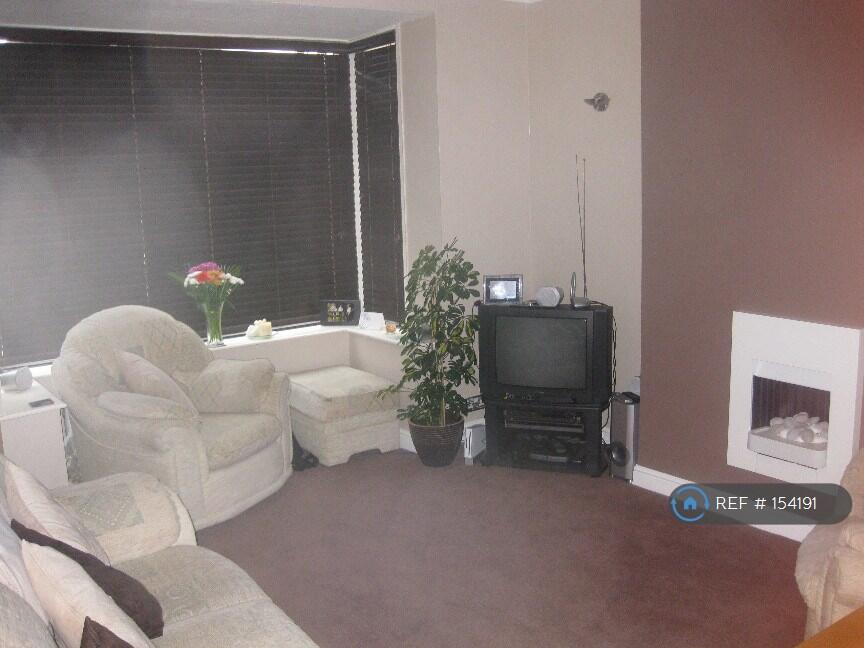 Lounge With Bay Window And Gas Fire