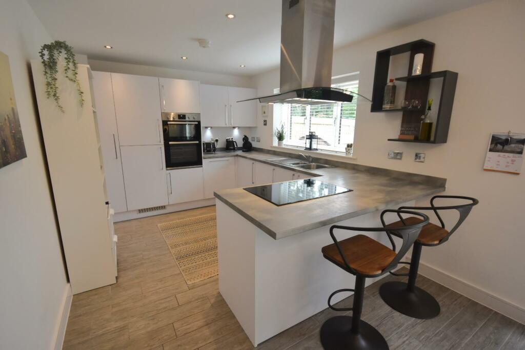 KITCHEN/DINING/TV AREA
