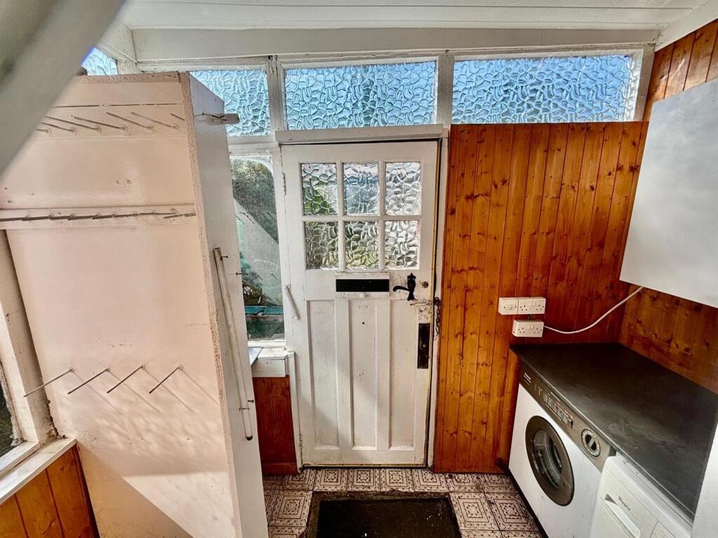 Rear Porch / Hallway / Utility Area: