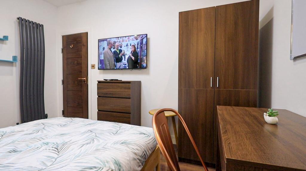 A stylish and inviting double bedroom featuring...