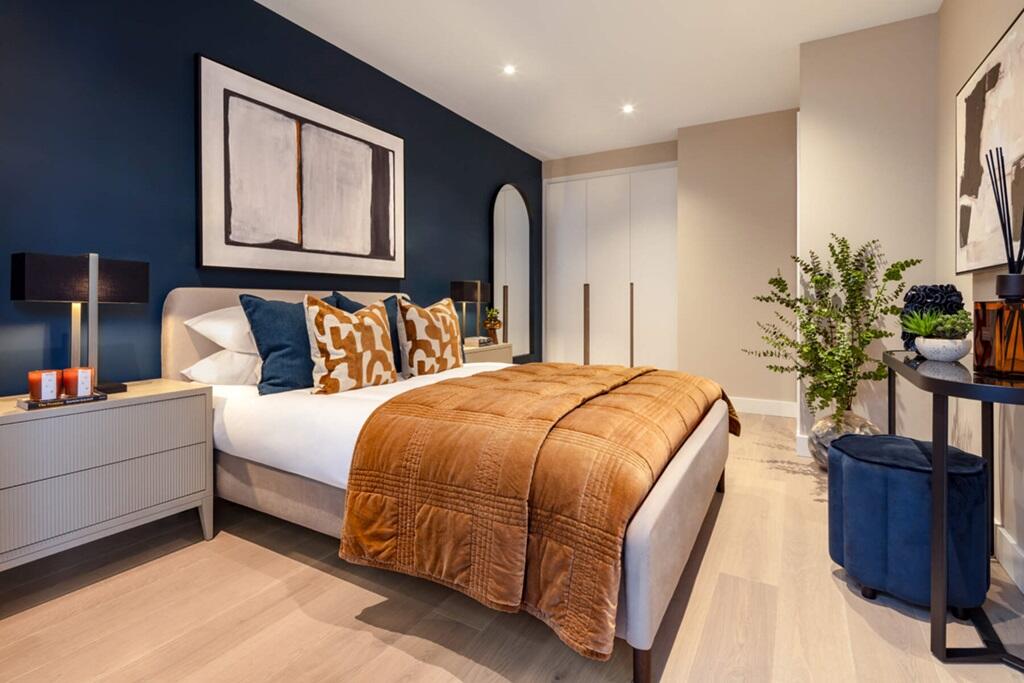 Bedroom with Elegantly finished wardrobes