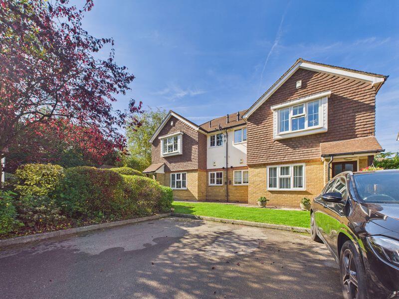 FRONT ASPECT FROM PARKING AREA