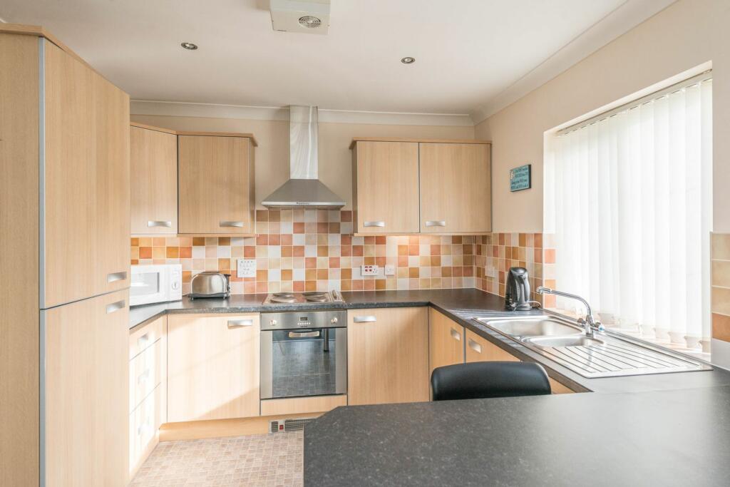 Sitting room and kitchen