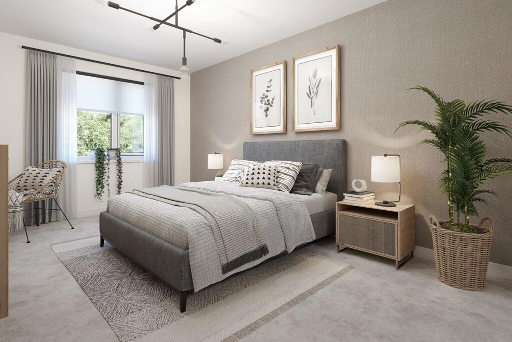 Bedroom 1 is spacious with plenty of storage space