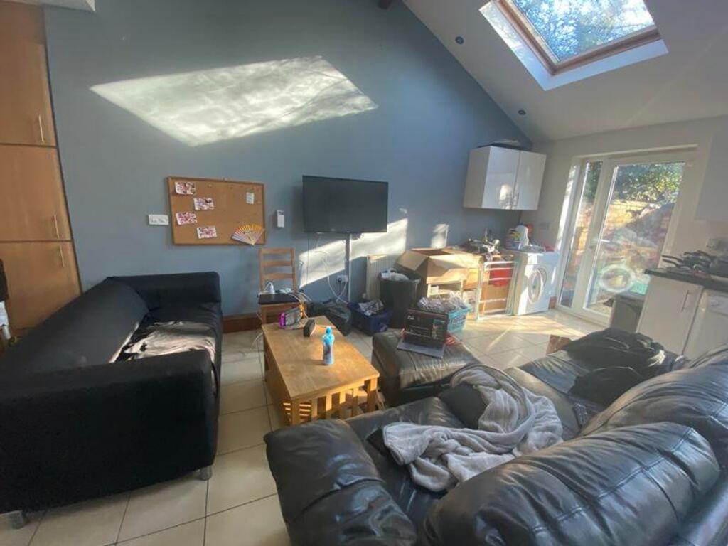 A spacious and inviting modern living room fill...
