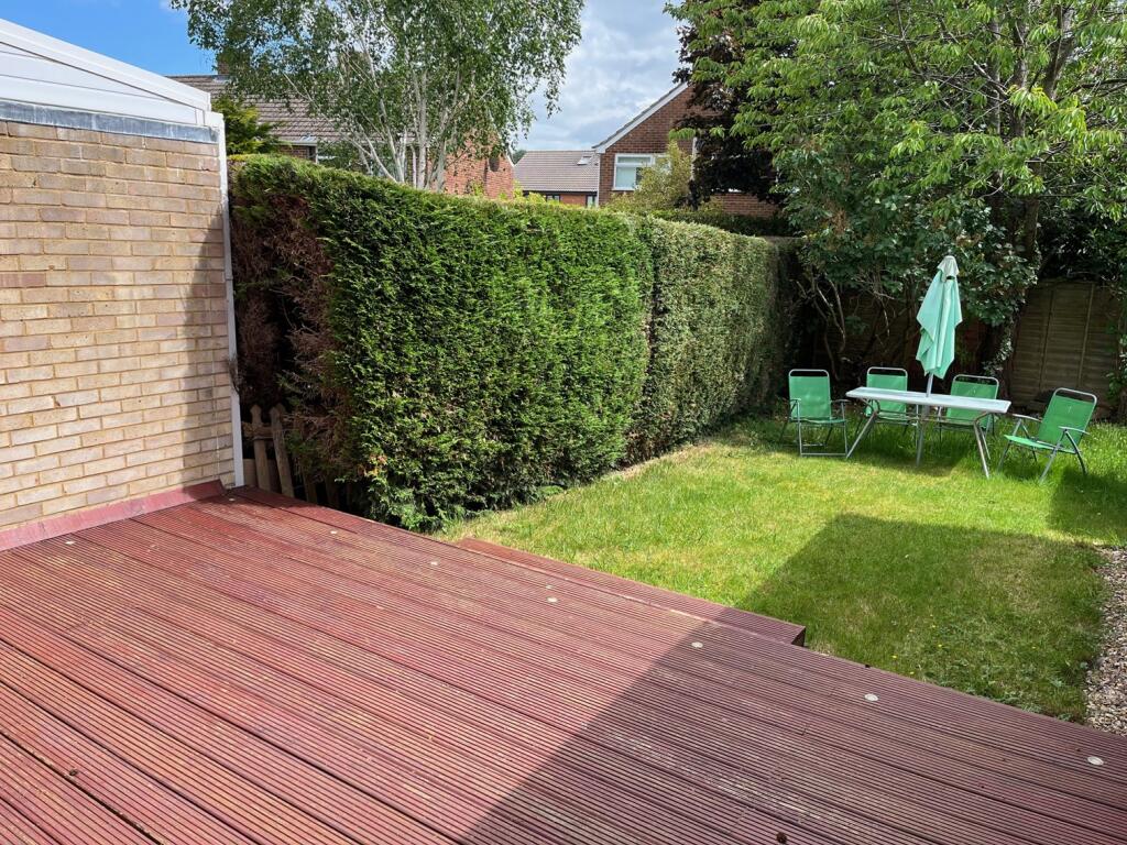 Sunny garden and deck