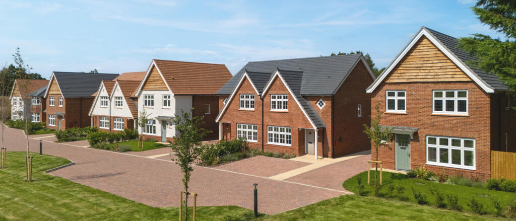 External street scene consisting of a Warwick and a Letchworth house type