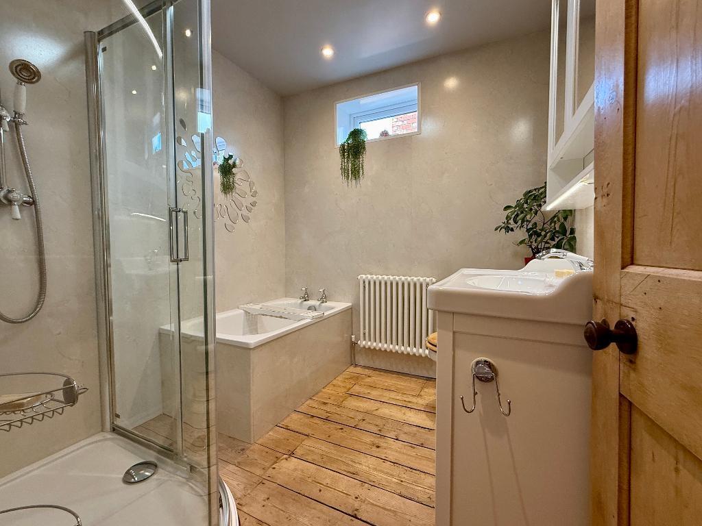 Family bathroom with bath &amp; shower