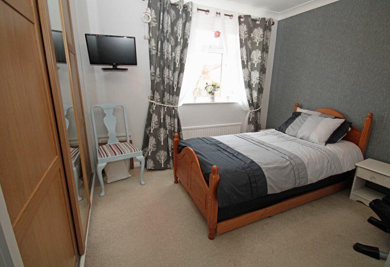 Master bedroom with fitted wardrobes