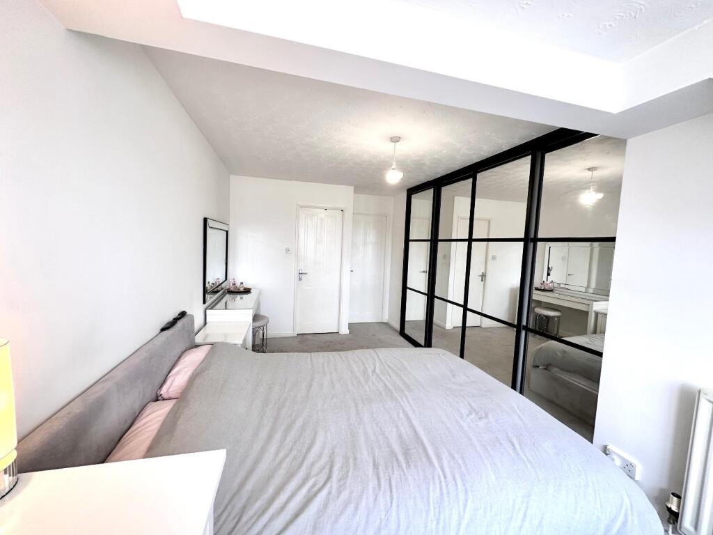 PRIMARY BEDROOM WITH EN-SUITE