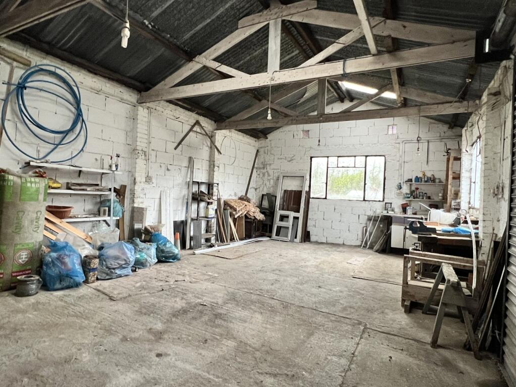 Detached double garage/workshop