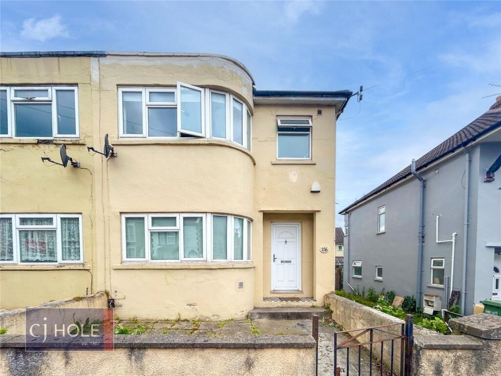 A well-maintained semi-detached house with a cl...