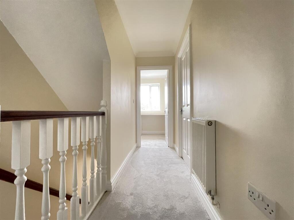 FIRST FLOOR LANDING