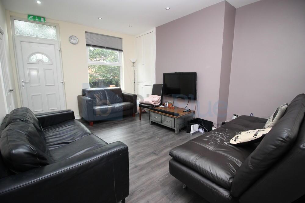 A contemporary living room featuring comfortabl...