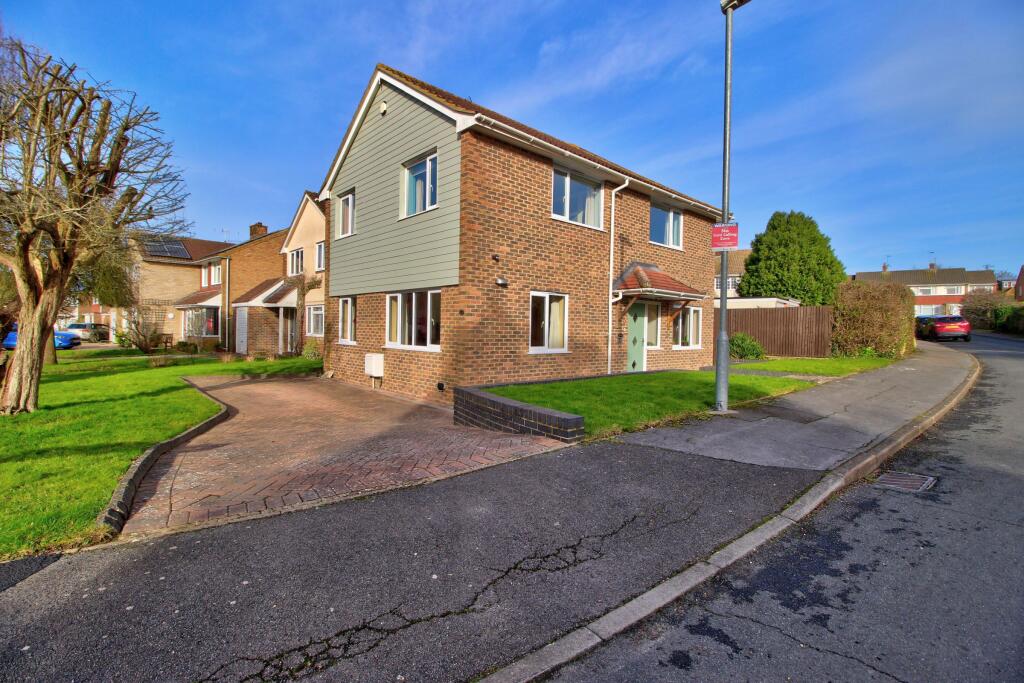 Driveway parking (and garage with parking to the r