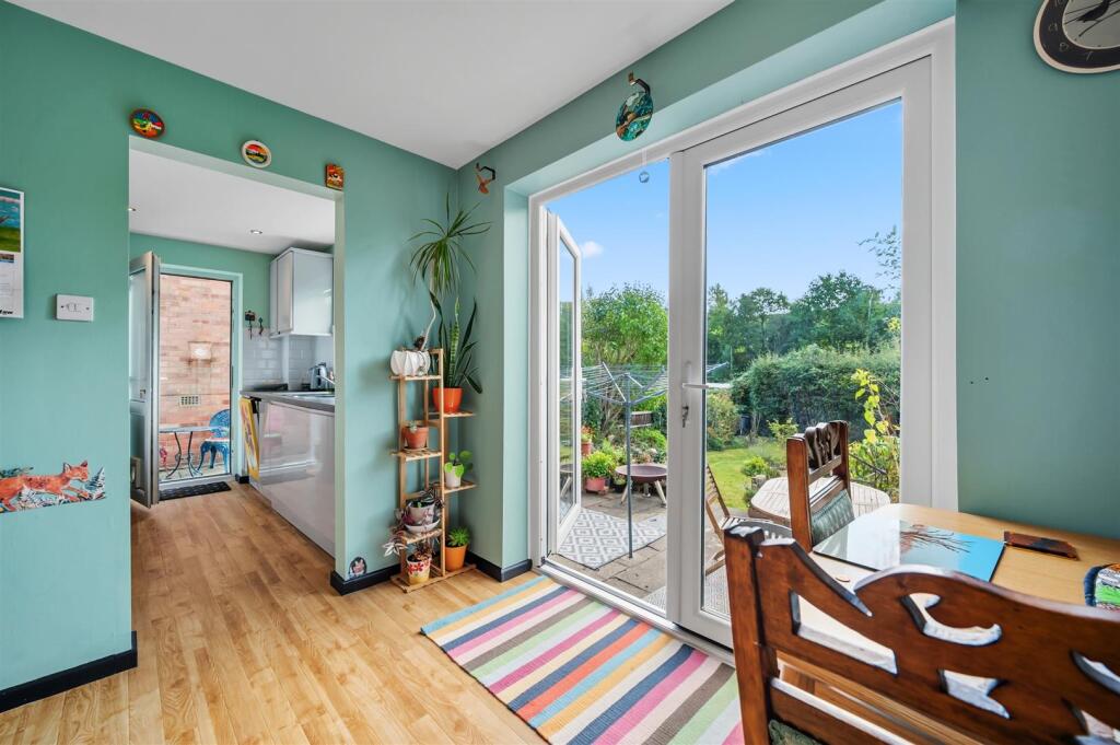 Dining Area to Kitchen and patio.jpg
