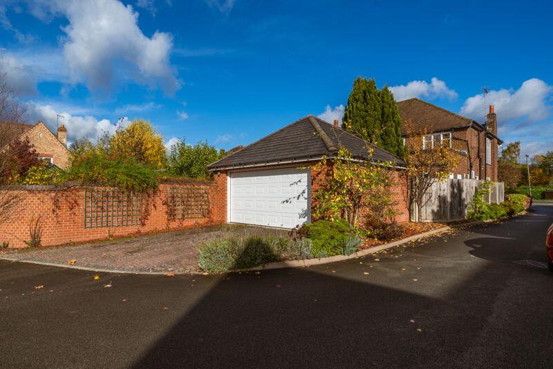 REAR DOUBLE GARAGE &amp; DRIVEWAY