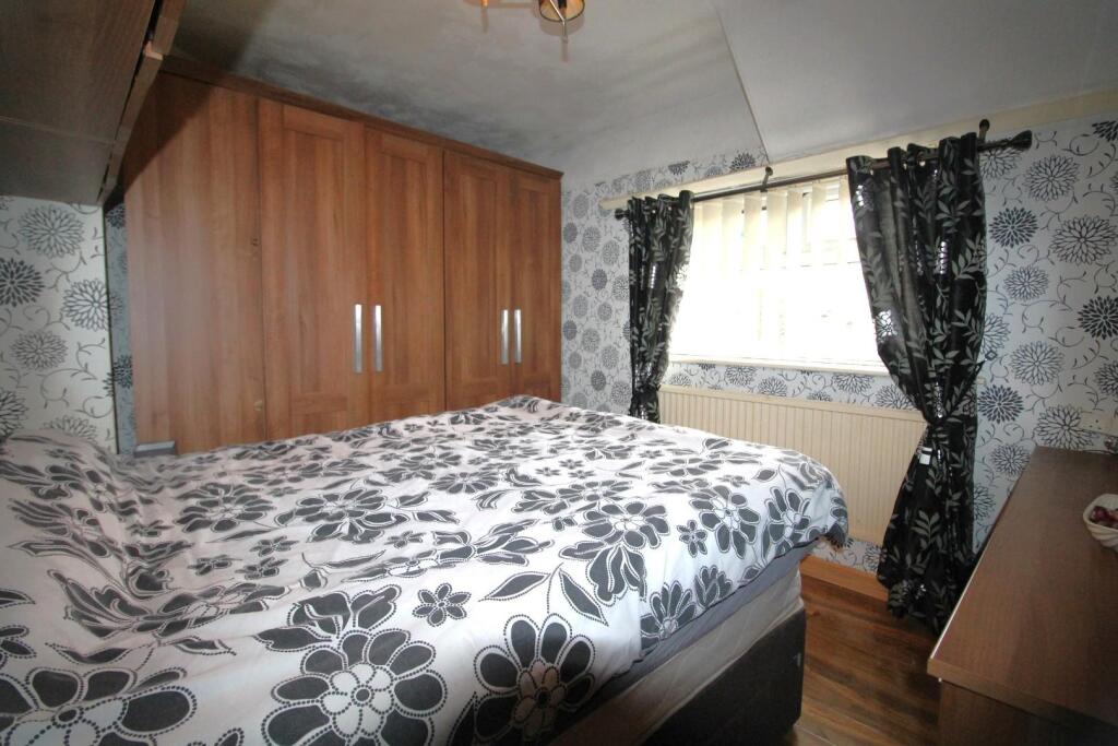 SECOND BEDROOM