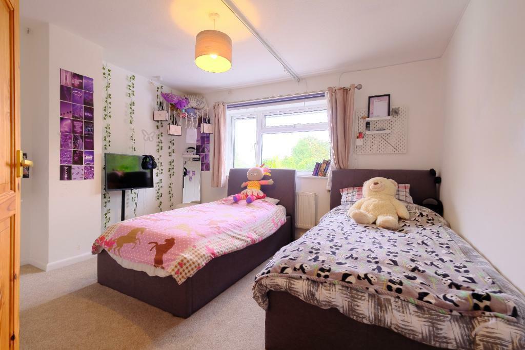 Bedroom 1 with garden views