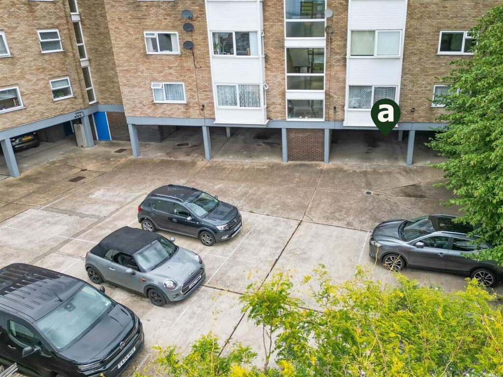 Communal Car Park + Assigned Space