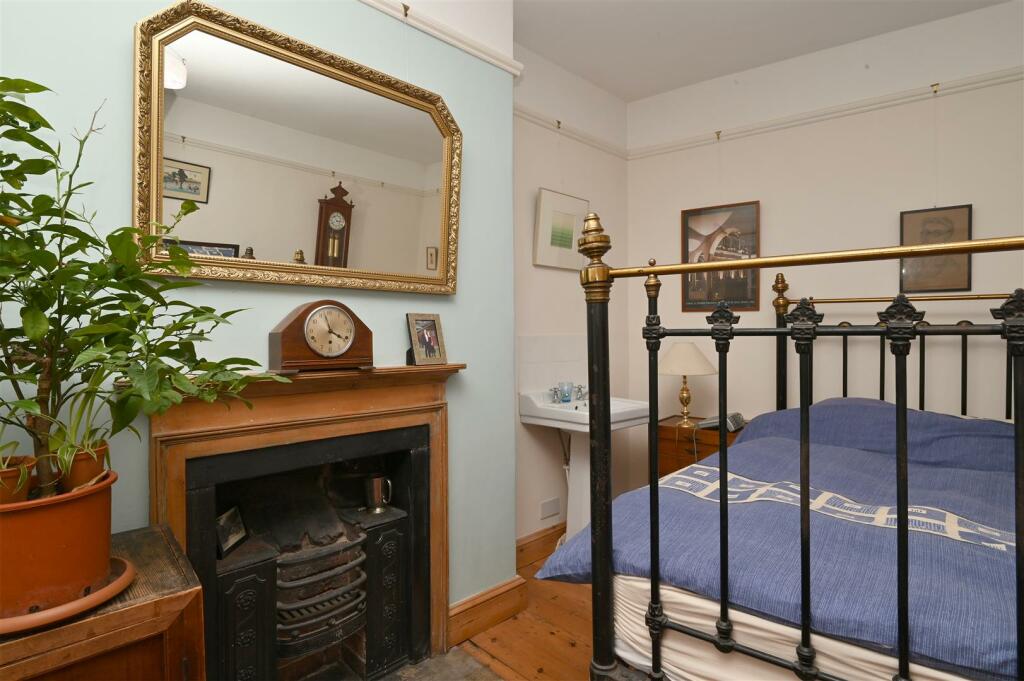 Bedroom Four fireplace.jpg