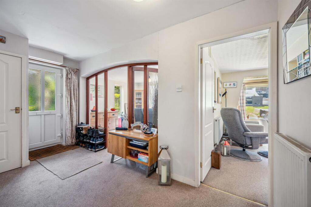 Entrance Hallway towards dining and sitting rooms.