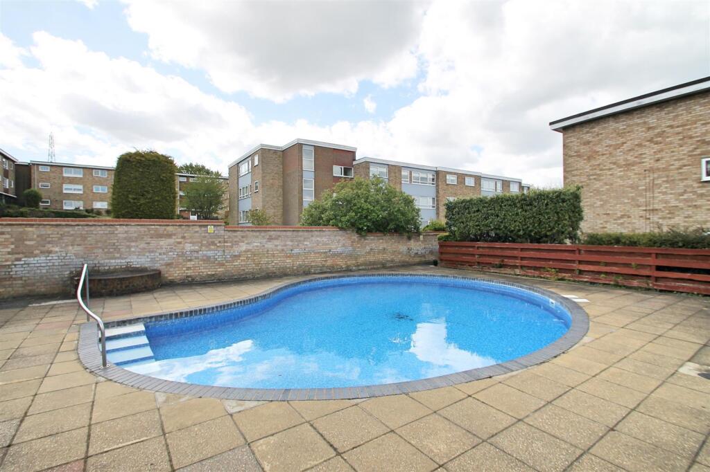 Communal Swimming Pool &amp; Squash Court:
