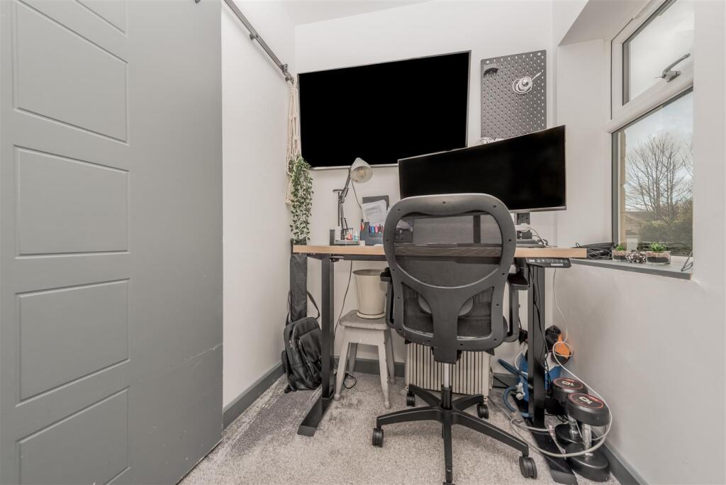 Converted Office / Storage Room: