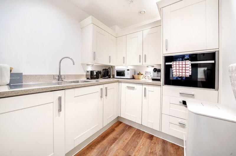 Kitchen with built-in appliances