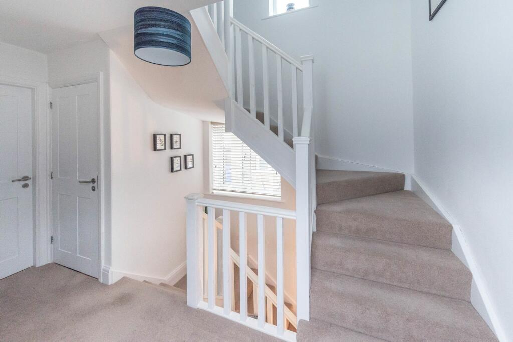 ENTRANCE HALLWAY AND LANDING