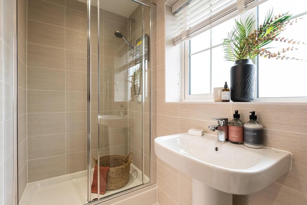 The en suite shower room provides added luxury to the main bedroom