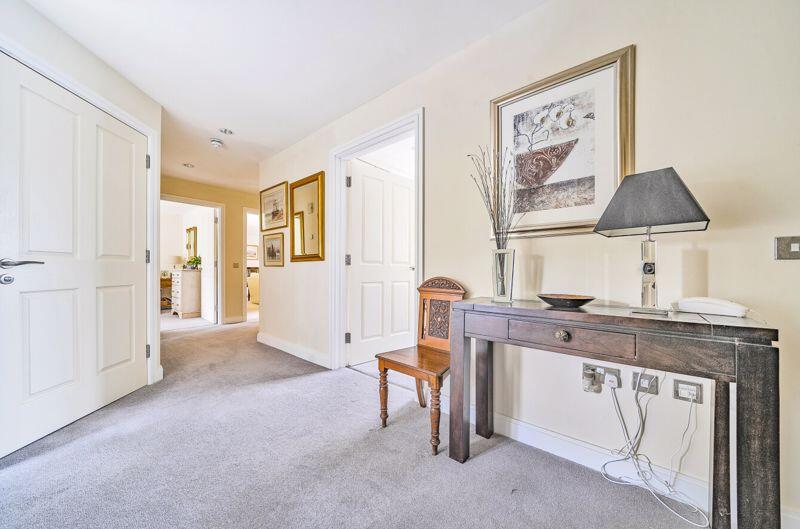 Entrance hall with storage cupboards