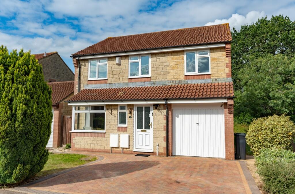 A charming and well-maintained exterior view of...