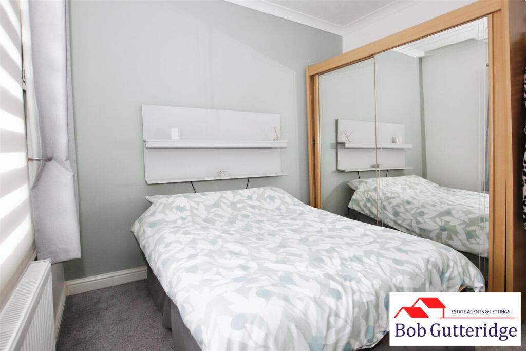 BEDROOM ONE (FRONT)