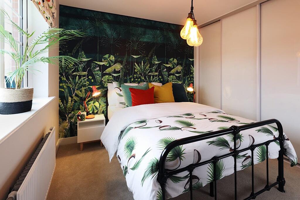 Bedroom 2 with wardrobe space, perfect for guests